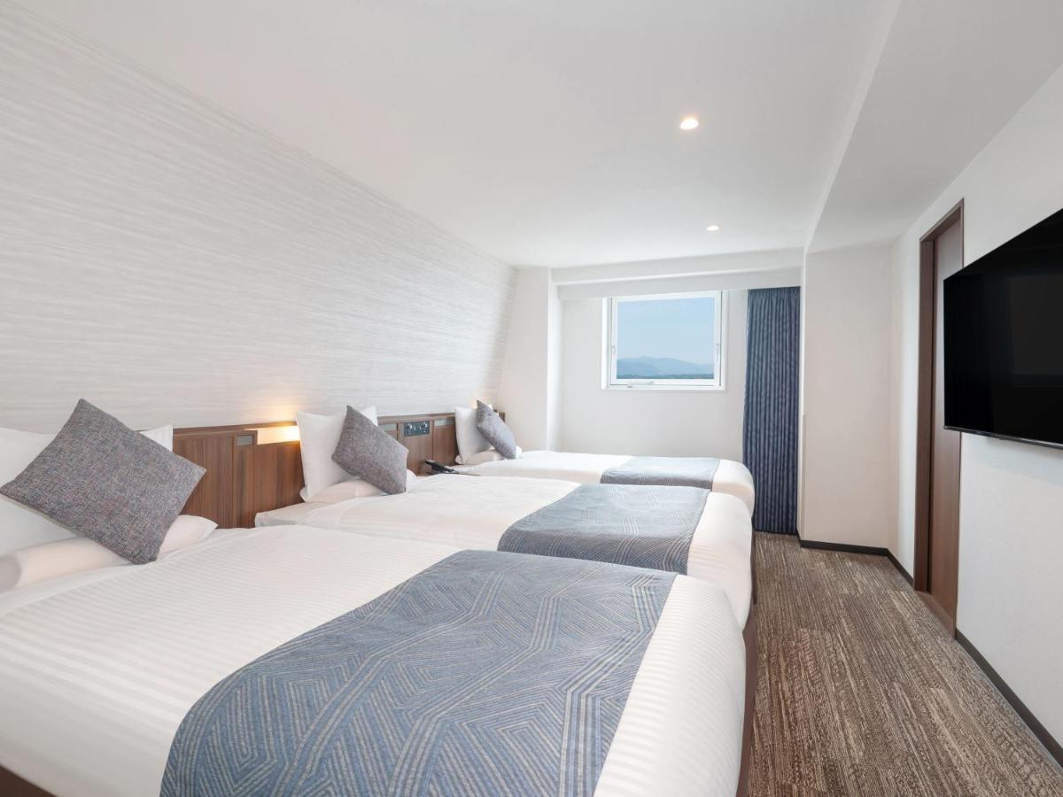Art Hotel Miyazaki Sky Tower Bagian luar foto